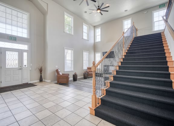 a view of the entryway and stairs to the second floor