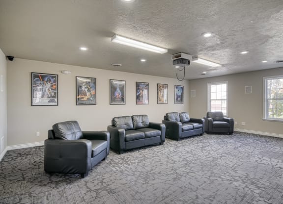 a large room with couches and chairs