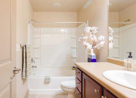 a bathroom with a sink and a toilet and a shower at Sugar House Apartments By Urbana, Salt Lake City, UT, 84105