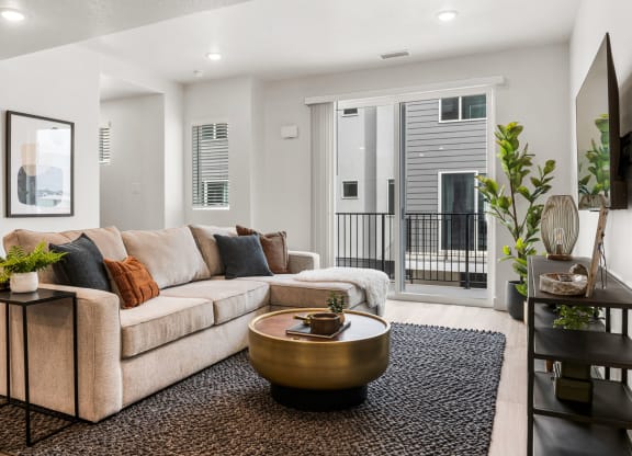 a living room with a large couch and a coffee table