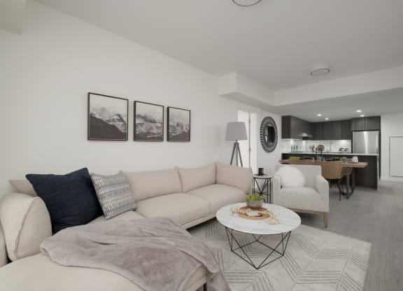 a living room with couches and a coffee table