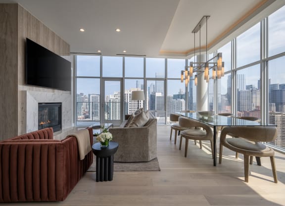 a living room filled with furniture and a large window