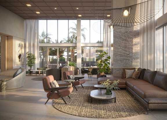 A modern living room with brown leather sofas and a large window.