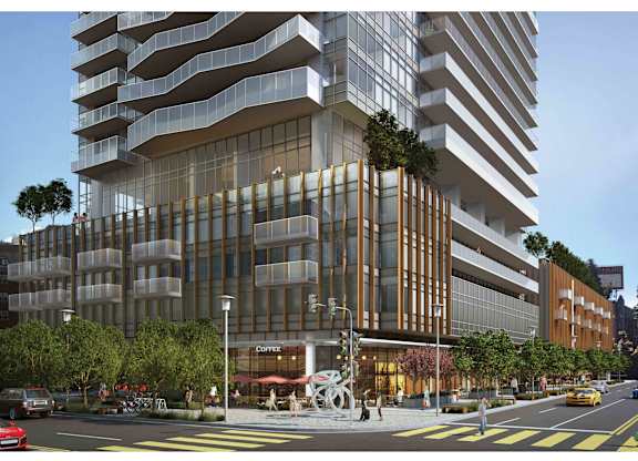 A modern building with a lot of windows and balconies.