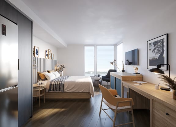 a bedroom with a bed and a desk at Marina Square, Bremerton, WA, 98337
