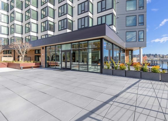 a view of a building with a large terrace in front of it at Marina Square, Bremerton, Washington 98337
