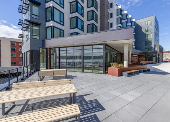 public walking area  with wooden bench seating at Marina Square, Bremerton, 98337