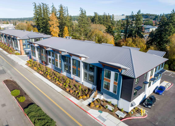 arial view of the roof of a building with trees at Rivulet, Silverdale, WA