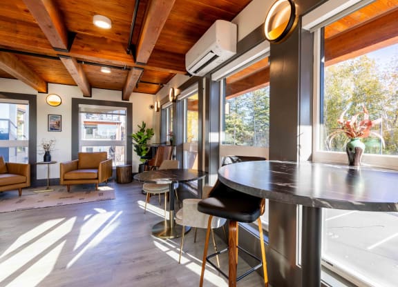 a kitchen with a counter and a large window at Rivulet, Silverdale, WA