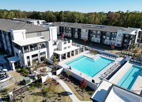 Aerial view of resort style pool and amenity center at The Wren Apartments, Georgia