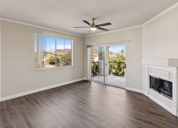 living room with a fireplace at Bridgeport Ranch apartments