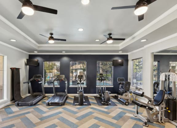 fitness center with cardio equipment at Bridgeport Ranch apartments