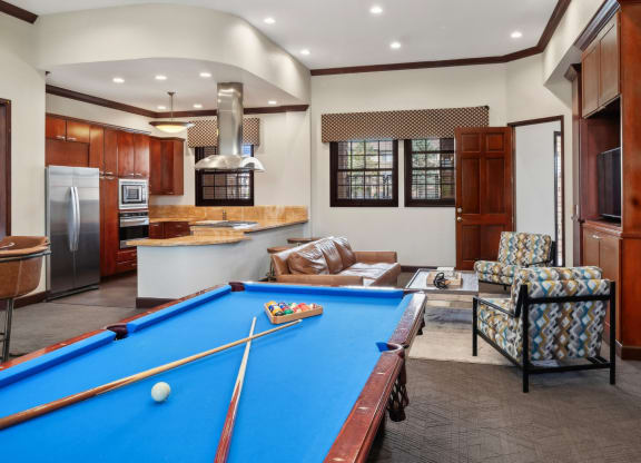 social area with billiards at Red Hawk Ranch apartments