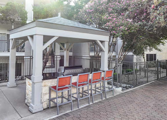 outdoor gazebo with grills and bar style seating at San Marin apartments