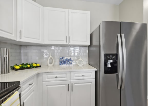 kitchen with stainless steel appliances at HighPoint luxury apartments in Quincy, MA