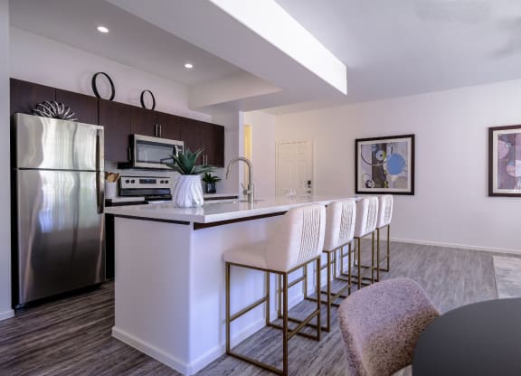 luxury kitchen with custom cabinetry at Avora apartments