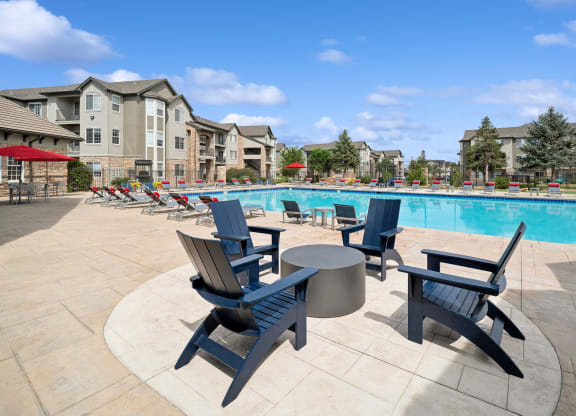 poolside lounging area at Red Hawk Ranch apartments