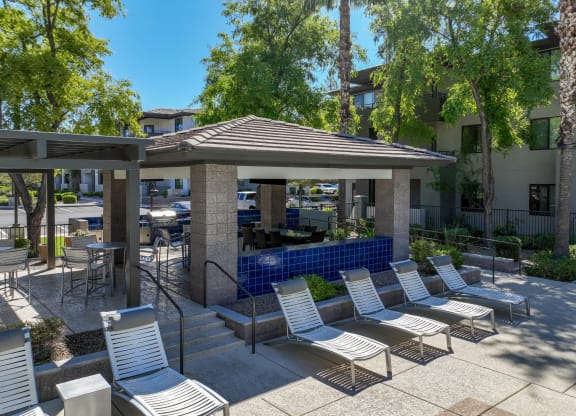 poolside lounging areas at Avora apartments