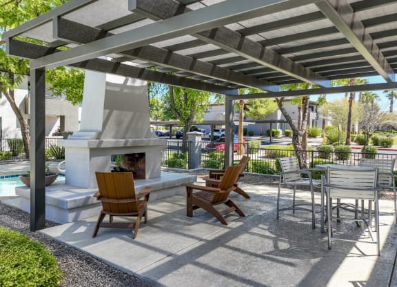 outdoor patio and fireside retreat at Avora apartmetns