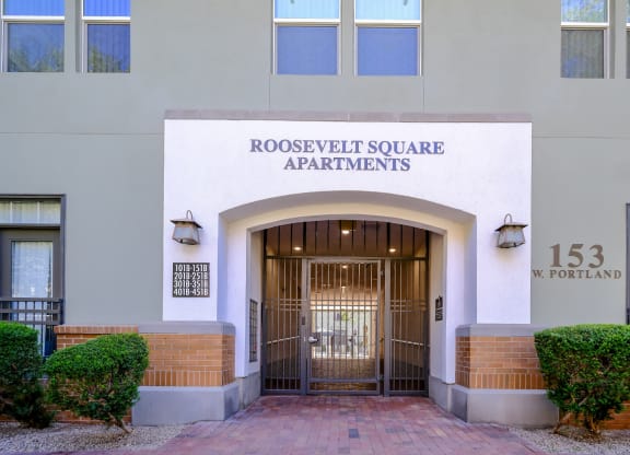 an entrance to Roosevelt Square luxury apartments