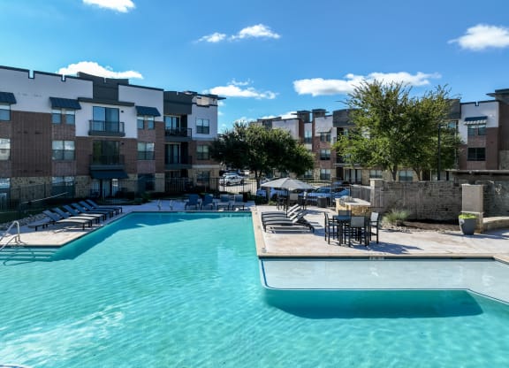 resort-inspired swimming pool at Soho Parkway apartments