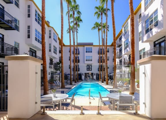swimming pool and poolside lounging areas at Roosevelt Square apartments