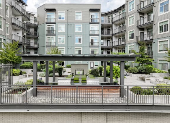 covered outdoor patio area at Elan Redmond apartments