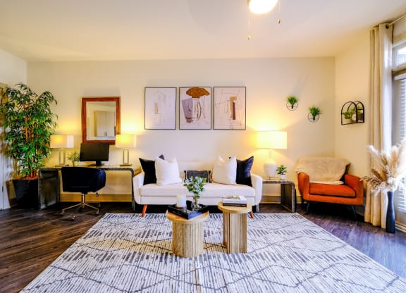 a living room with a couch and a table