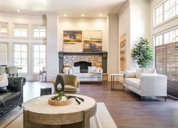 social lounge with fireside conversation areas at Stoneleigh on Spring Creek apartments