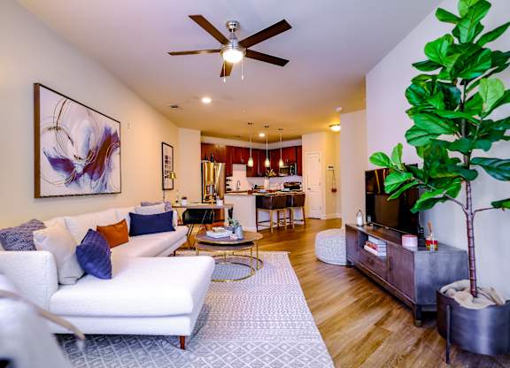 Berkshire Village District apartments living room with hardwood-inspired flooring