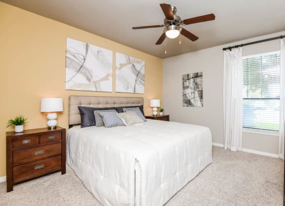 Falls at Eagle Creek apartments bedroom with ceiling fan
