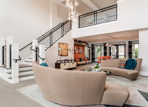 Village at Marquee Station apartments social lounging area with comfortable seating