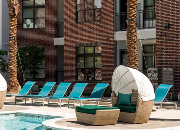 swimming pool with cabanas at Tinsley on the Park apartments
