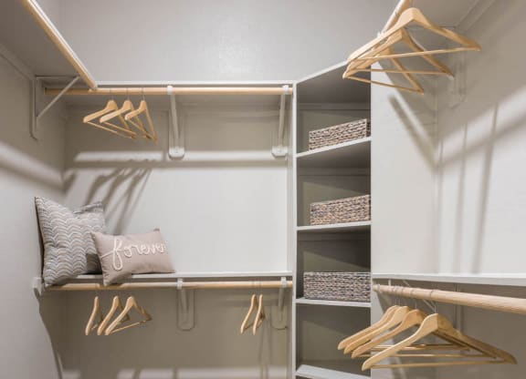 a walk in closet with shelves at Tinsley on the Park apartments