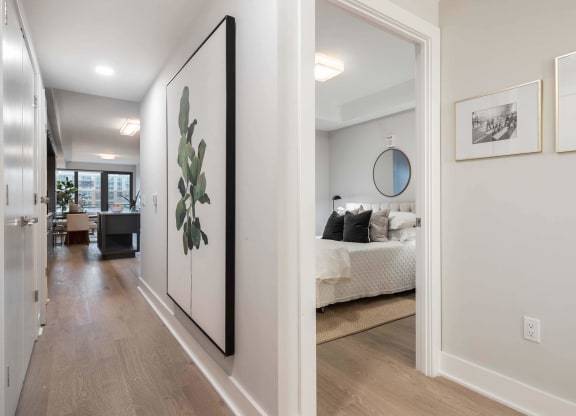 a bedroom and open hallway at Tribeca NOMA apartments