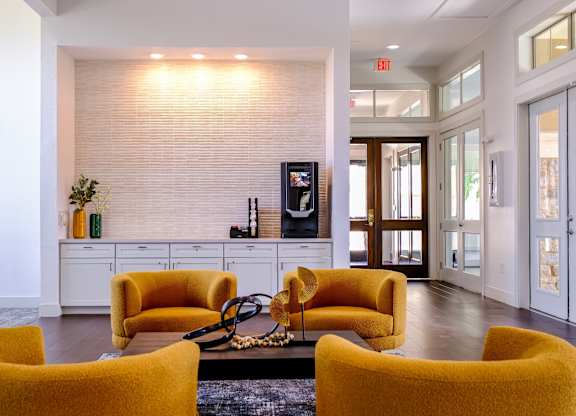 social area with conversational seating at The Falls at Copper Lake apartments