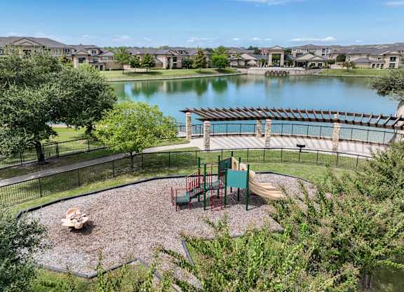 lakeside playground at The Falls at Copper Lake apartments