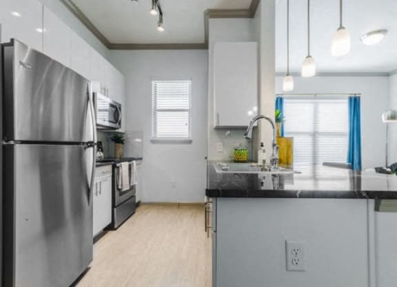 Efficient Appliances In Kitchen at Berkshire Preserve, Garland, 75044
