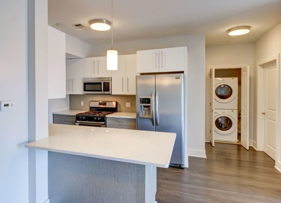 One and Two Bedroom Apartments in Charlestown MA with Bay Windows with Open-Concept Gourmet Kitchen with Breakfast Bar, Stainless Appliances and Washer Dryer