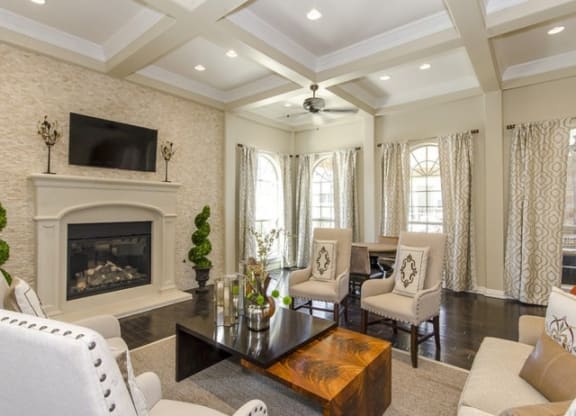Lounge Area With Fireplace at Villages of Briggs Ranch, Texas