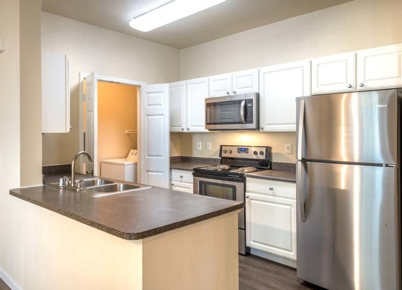 Kitchen showing stainless steel appliances