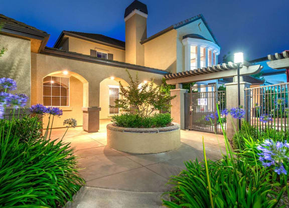 Clubhouse Exterior with Lush Landscape