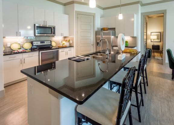 Eat-In Kitchen Table With Sink at Berkshire Spring Creek, Texas, 75044