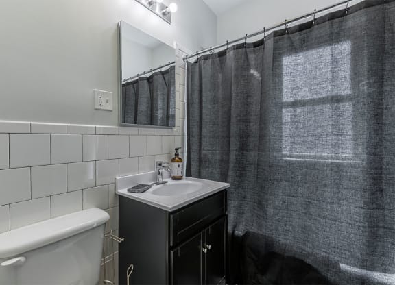The Edison apartments bathroom with tile surrounds