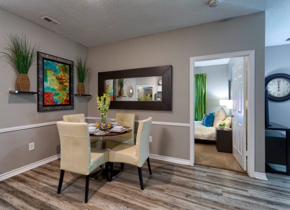 Dining room with wood inspired flooring at Wyndchase Aspen Grove, Franklin