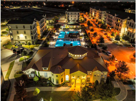 Evening Aerial View of Reveal at Bayside Apartments  8400 Sunset Blvd Rowlett, TX 75088