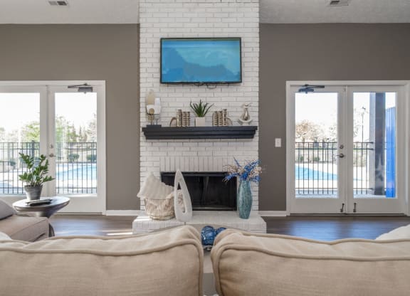 Sterling Park apartments social lounge with fireplace