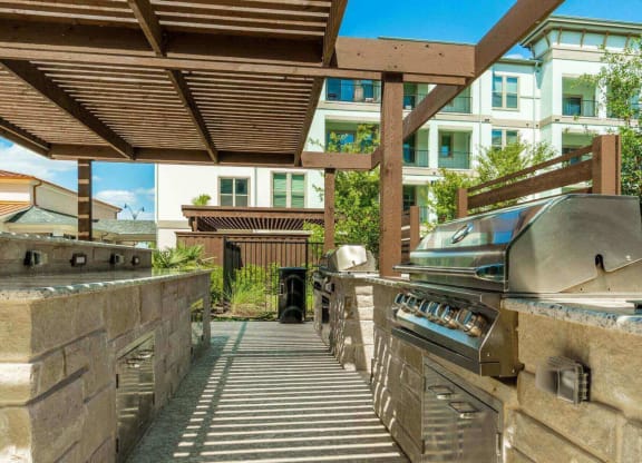 Grill outside at Reveal at Bayside, Rowlett, TX, 75088