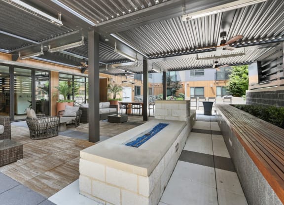 Trellis House apartments outdoor covered, open-air patio with comfortable lounging areas