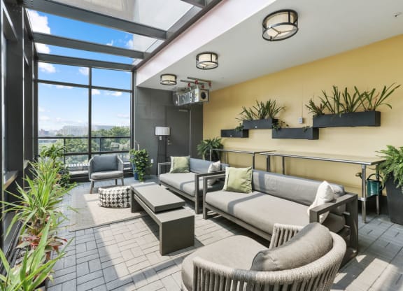 Trellis House apartments social lounging area with breathtaking cityscape views